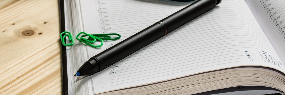Notizbuch mit Stift